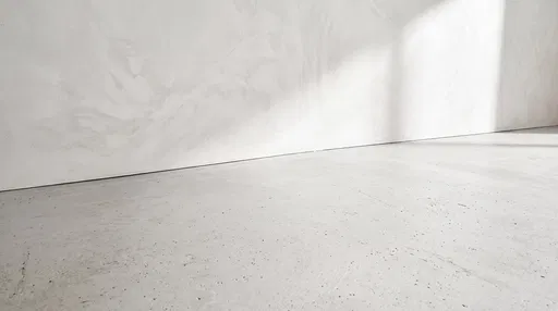 Minimalist Concrete Surface and White Limewash Wall