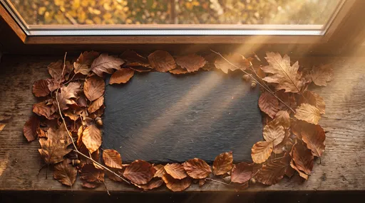 Autumn Leaves Framing Dark Slate on Windowsill