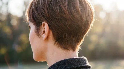 Close-Up of Chestnut Pixie Haircut Outdoors