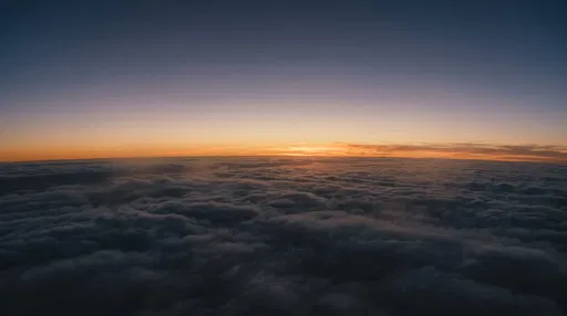 Aerial View Above Clouds at Twilight