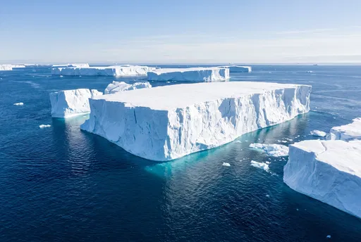 Tabular Icebergs in Deep Blue Ocean