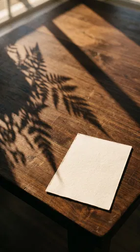 Blank Linen Card on Sunlit Wooden Table