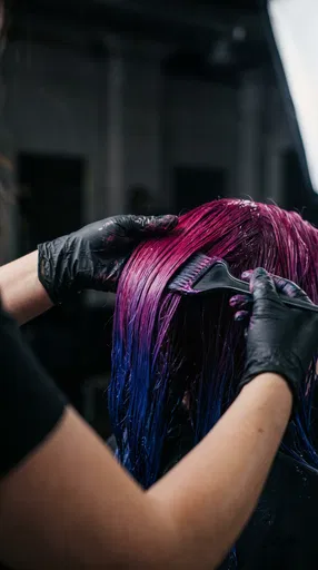 Stylist Applying Magenta and Blue Hair Dye