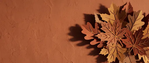 Paper Cut Autumn Leaves on Terracotta