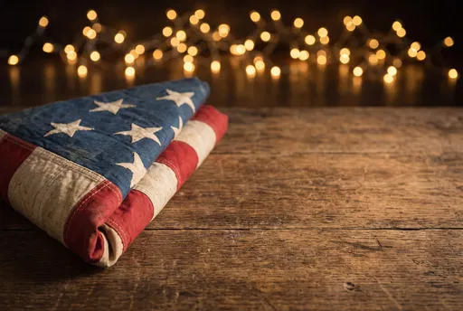 Folded Vintage American Flag on Wood