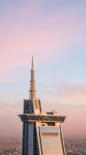 Modern Skyscraper Spire at Sunset