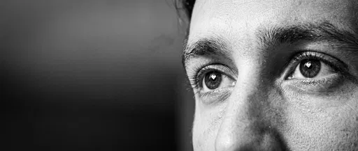 Monochrome Close-Up of Man with Heart Eyes