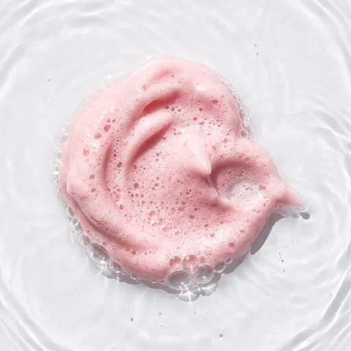 Pink Cleansing Foam Floating on Water