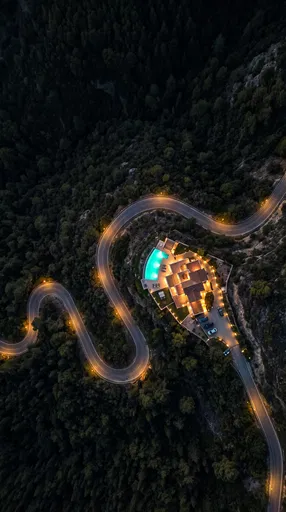Aerial Night View of Hillside Villa