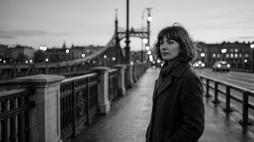 Monochrome Portrait of Woman on City Bridge