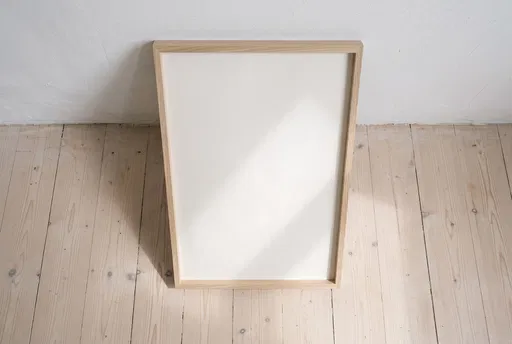 Blank Oak Frame Leaning Against Wall