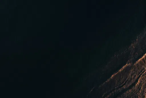 Dark Ocean Water with Warm Ripples