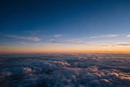 Aerial View Above Sunset Clouds