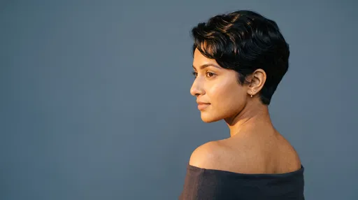 Woman With Wavy Black Pixie Cut