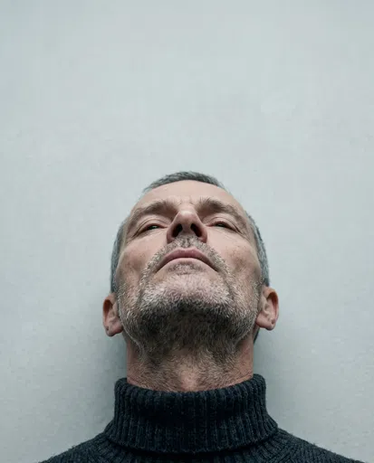 Sculptural Portrait of Man Looking Up