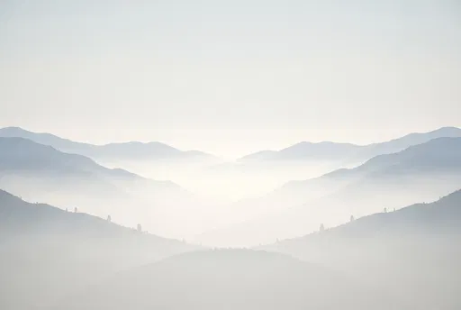 Symmetrical Misty Grey Blue Mountain Ridges