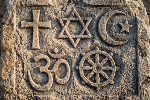 Carved Stone Relief of Religious Symbols