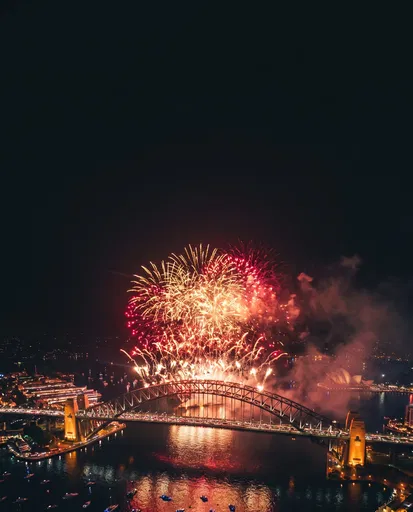 Fireworks Over Illuminated Harbor Bridge