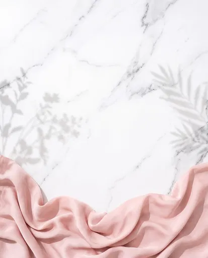 White Marble Backdrop With Pink Silk