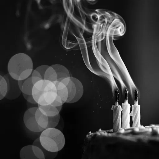 Monochrome Blown Out Birthday Candles With Smoke