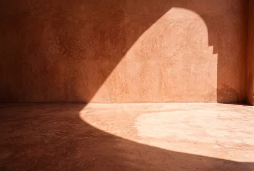 Sunlit Terracotta Plaster Wall and Floor