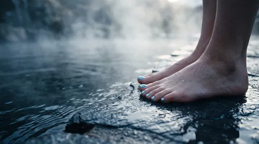 Bare Feet at Thermal Spa Pool Edge
