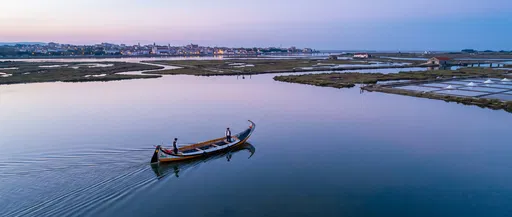 Moliceiro Boat on Aveiro Lagoon at Dusk