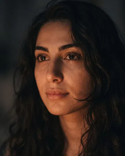 Close-Up Portrait of Woman in Warm Light