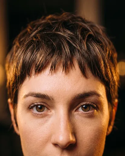 Close-Up of Woman With Brown Pixie Cut