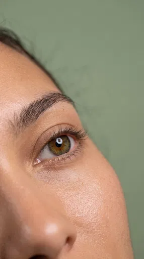 Macro Close-Up of Hazel Eye and Skin
