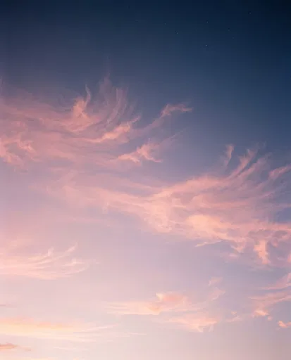Wispy Pink Dawn Clouds and Stars