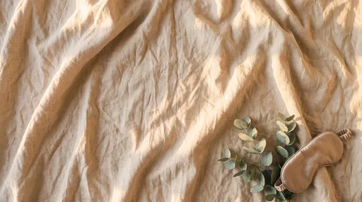Silk Sleep Mask and Eucalyptus on Linen