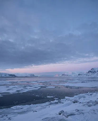 Serene Arctic Bay Winter Sunset