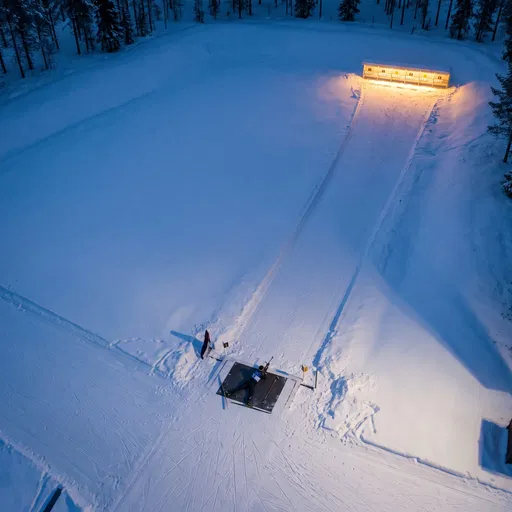 Aerial View of Biathlete at Night Range