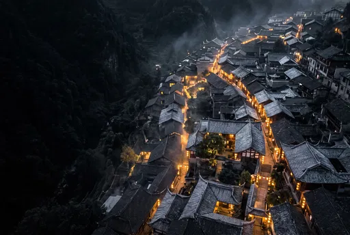 Aerial Night View of Historic Mountain Town
