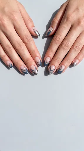 Hands With Blue And Silver Geometric Manicure