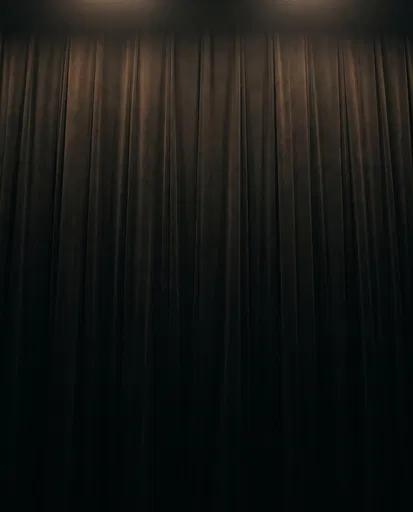 Dark Stage Curtain With Warm Top Light