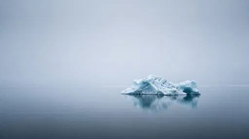 Minimalist Iceberg in Calm Polar Waters