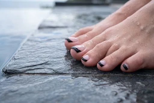 Black French Tip Pedicure on Wet Slate