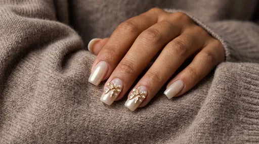 Pearl Manicure With Gold Bows