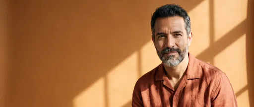 Mature Hispanic Man in Warm Sunlight