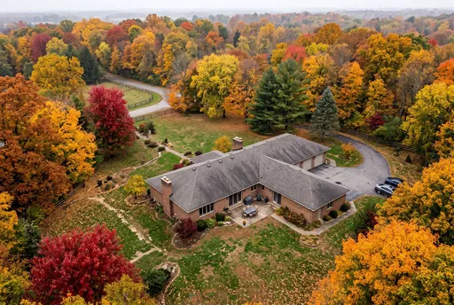 Aerial View of Brick Ranch House in Autumn