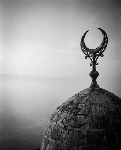 Monochrome Crescent Finial on Weathered Stone Dome