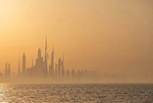 Golden Hazy Skyline Over Ocean Horizon