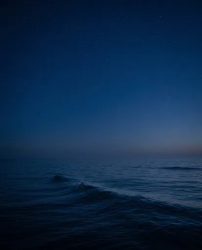 Starry Night Sky Over Calm Ocean