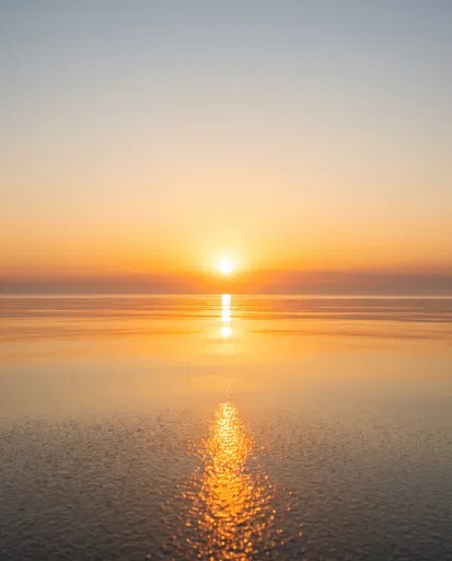 Golden Sunset Reflection Over Calm Water