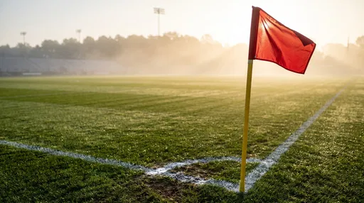 Red Soccer Corner Flag at Sunrise