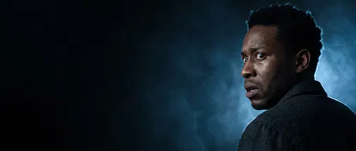 Terrified Man Looking Back Into Dark Void
