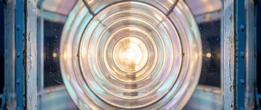 Glowing Lighthouse Fresnel Lens Close-Up