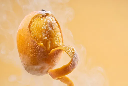 Frozen Partially Peeled Mango With Mist